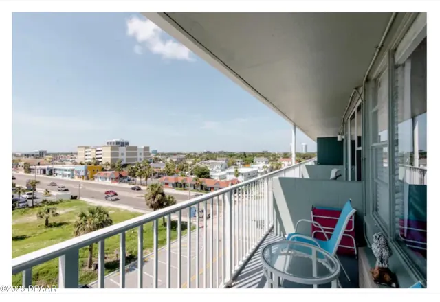 a bathroom with a toilet and a bathtub