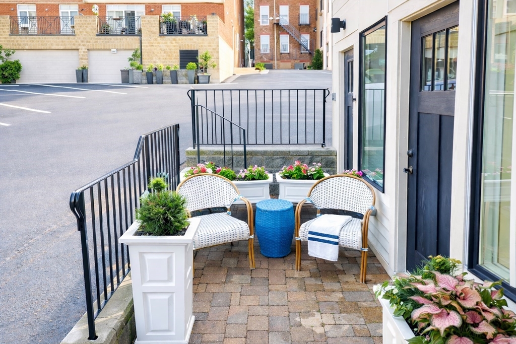 435 East 3rd Street, Unit 2 Boston, MA 02127 - Photo 23 of 24 a view of a chair and table in the balcony