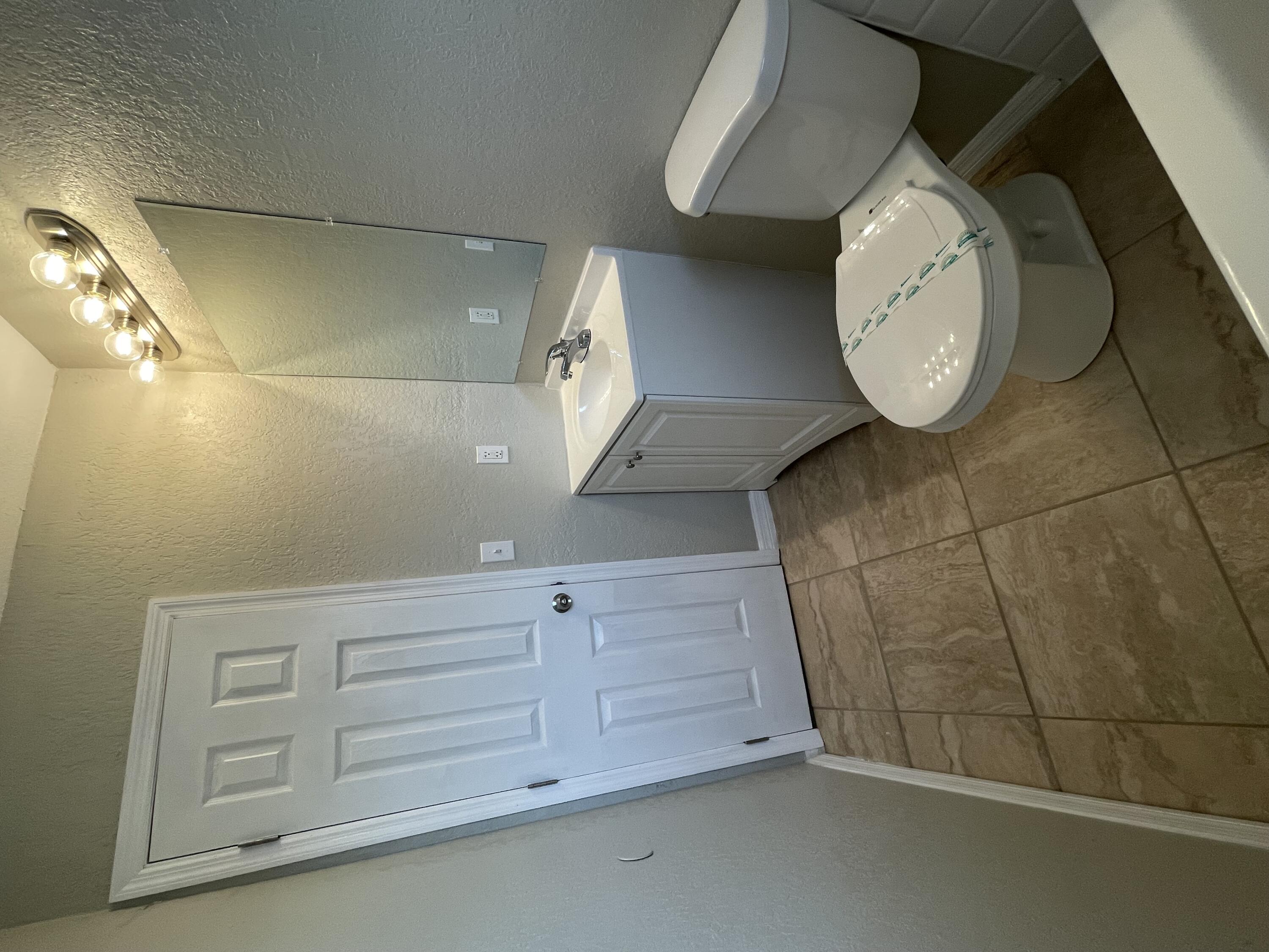 2880 Harson Way Fort Pierce, FL 34946 - Photo 30 of 40 a view of a storage & utility room