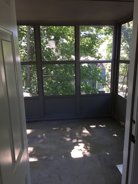 31 Pine Street Dedham, MA 02026 - Photo 11 of 11 a view of an empty room with a window