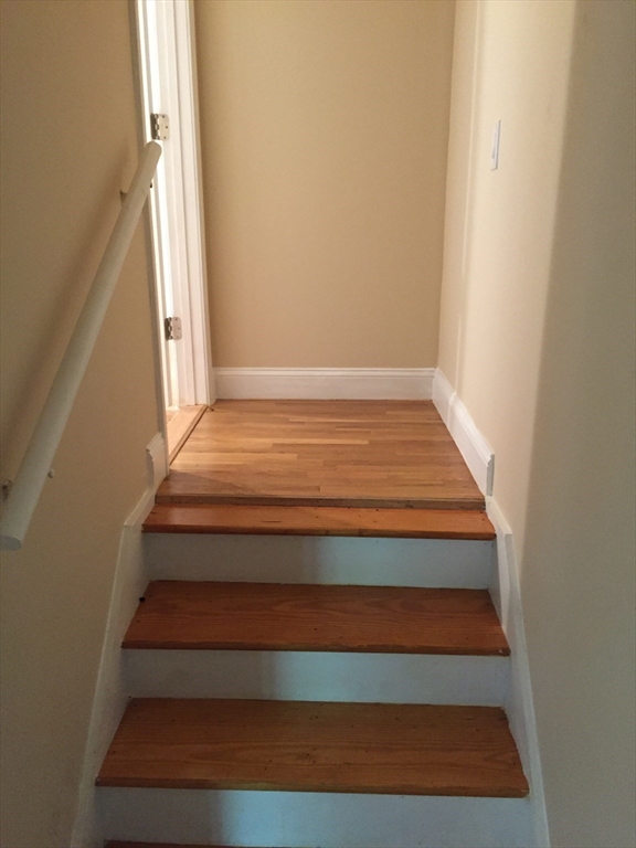 31 Pine Street Dedham, MA 02026 - Photo 6 of 11 a view of staircase