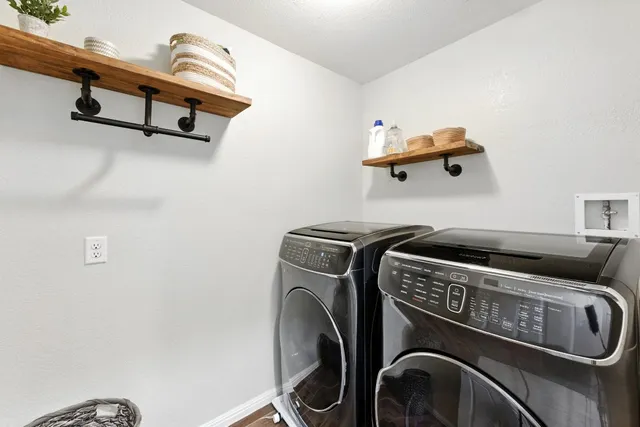 a balcony with furniture and a window