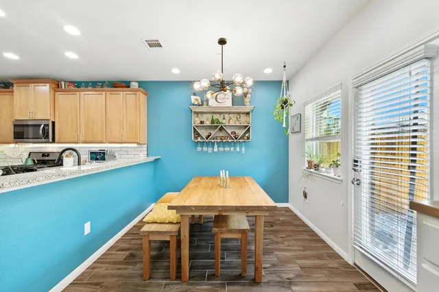 a front view of a house with wooden floor