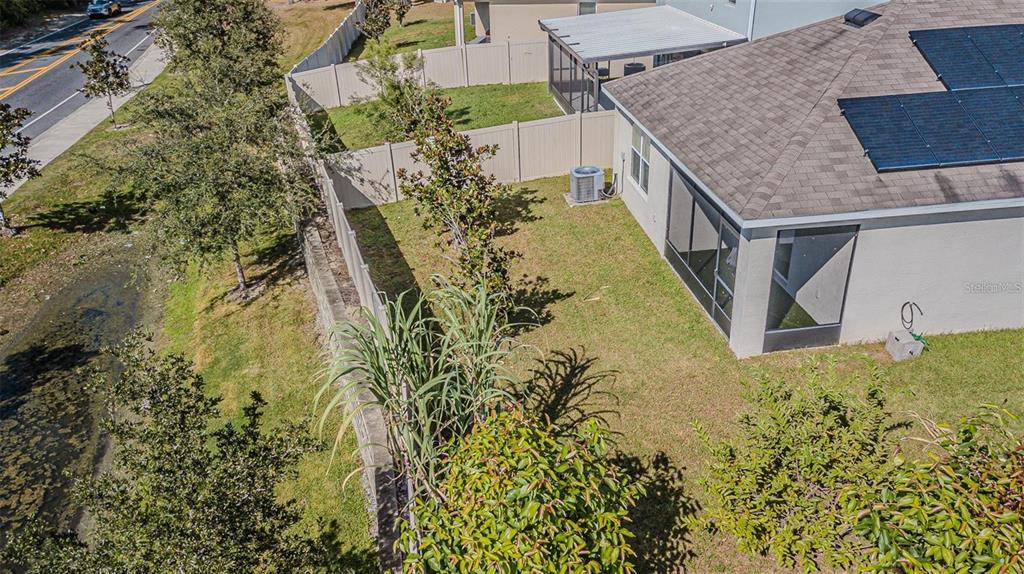 10853 Trailing Vine Drive Tampa, FL 33610 - Photo 4 of 15 an aerial view of residential house with pool and garden
