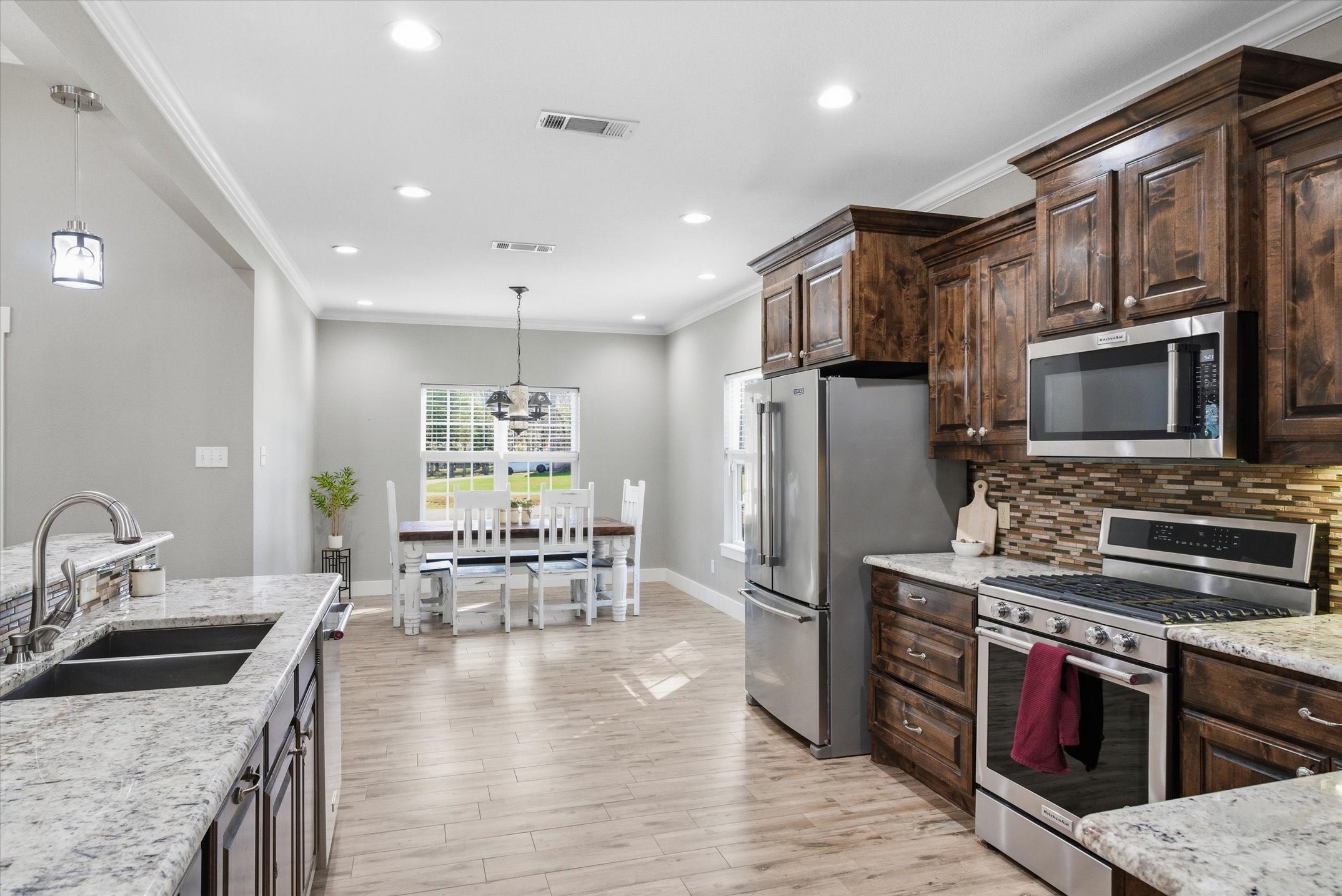 271 Rscr 4269 Emory, TX 75440 - Photo 23 of 48 a kitchen with stainless steel appliances granite countertop a refrigerator stove microwave and sink