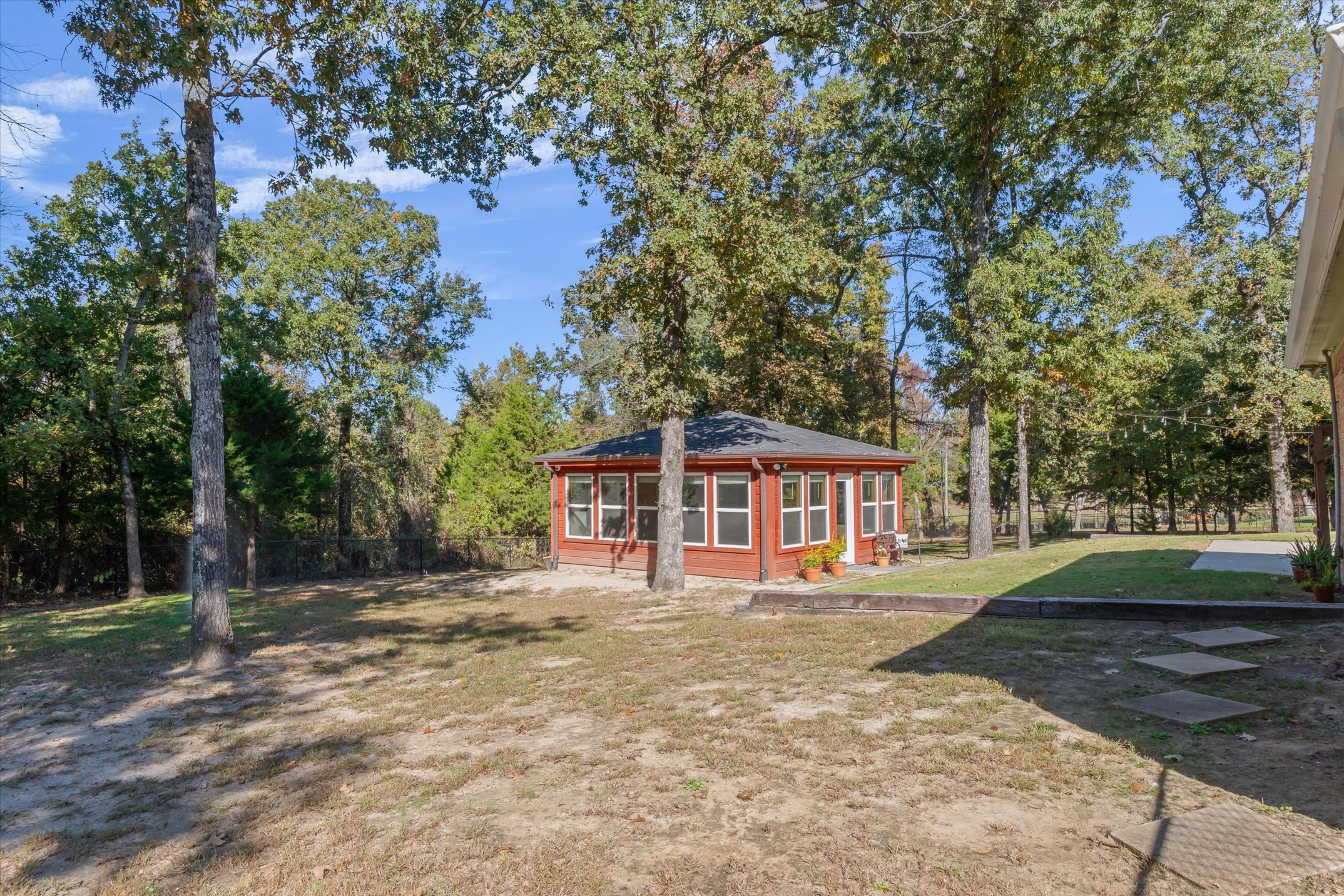 271 Rscr 4269 Emory, TX 75440 - Photo 36 of 48 a front view of a house with a yard