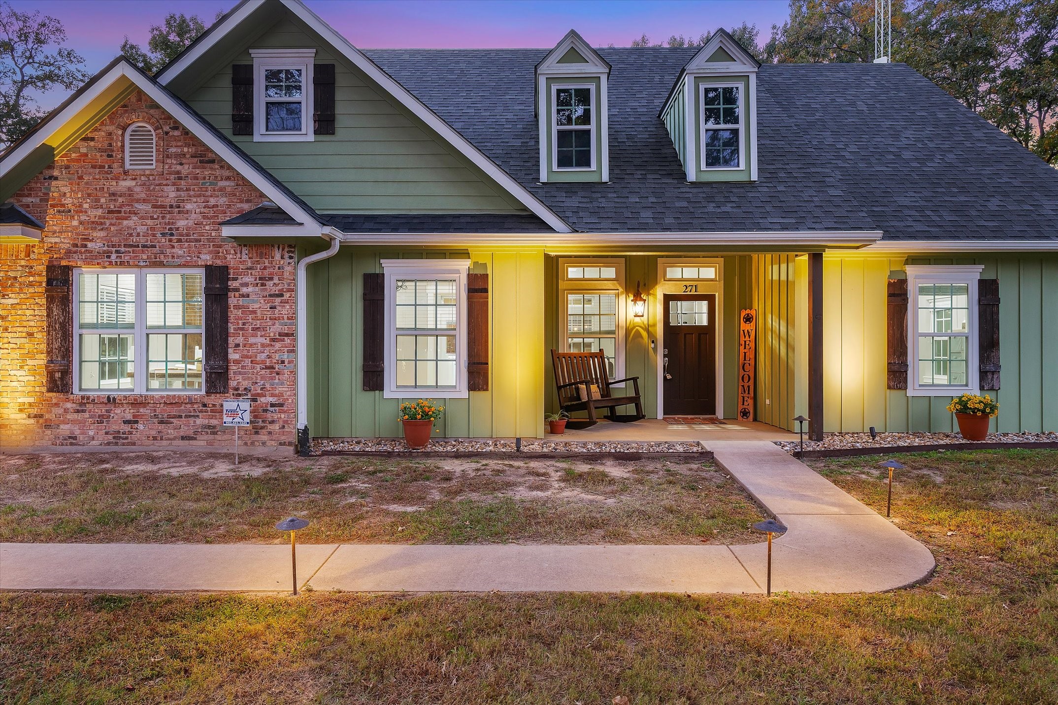 271 Rscr 4269 Emory, TX 75440 - Photo 6 of 48 a front view of a house with a yard