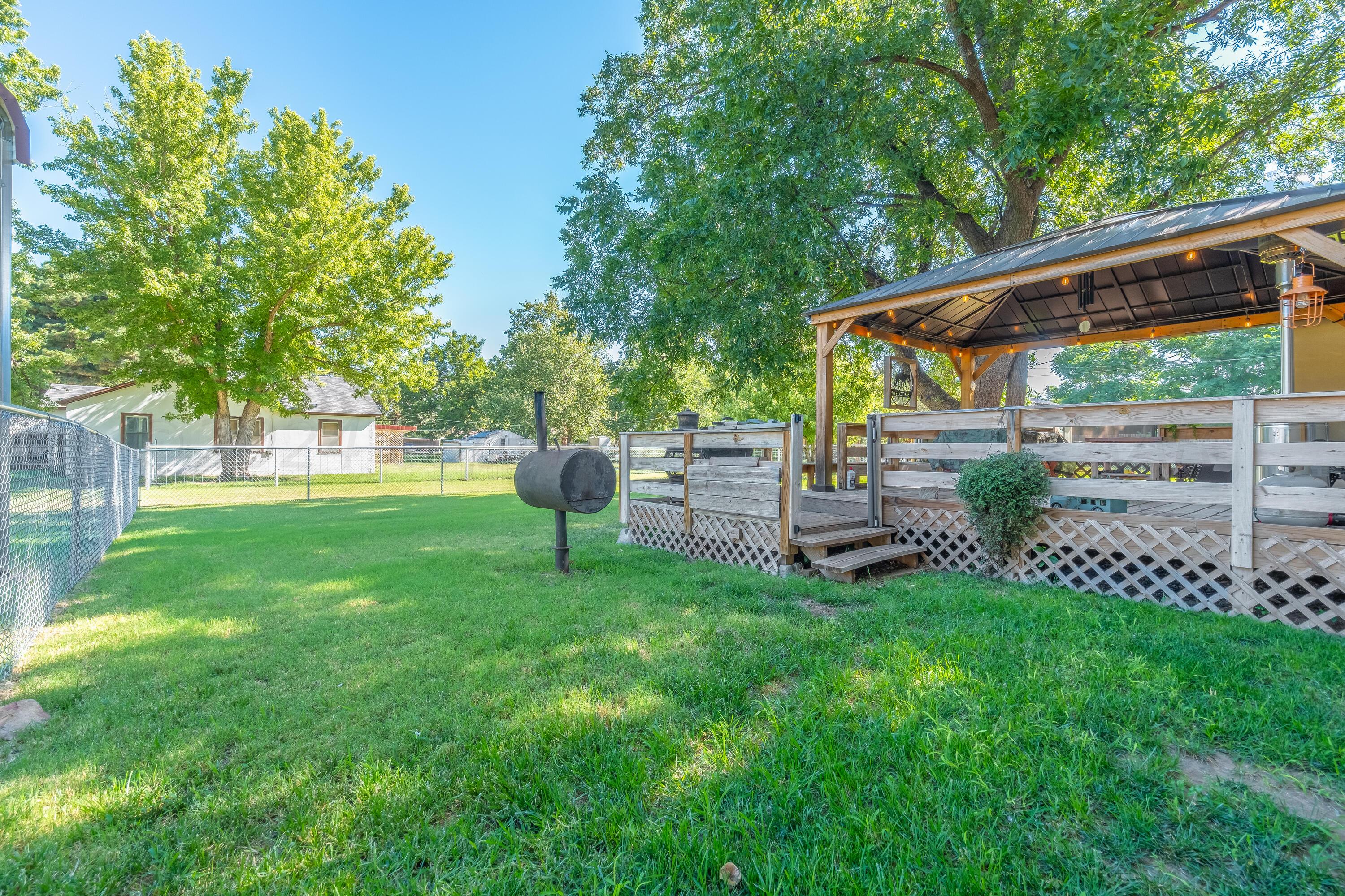 511 Cheyenne Street Wheeler, TX 79096 - Photo 36 of 45 a view of a chair and table in the garden