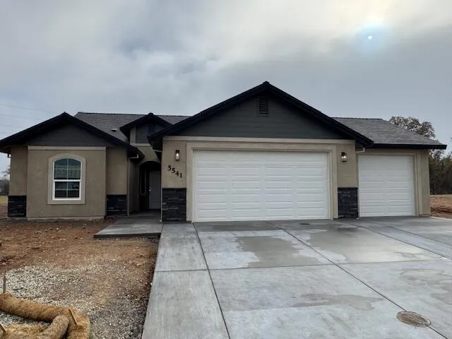 front view of a house with a garage