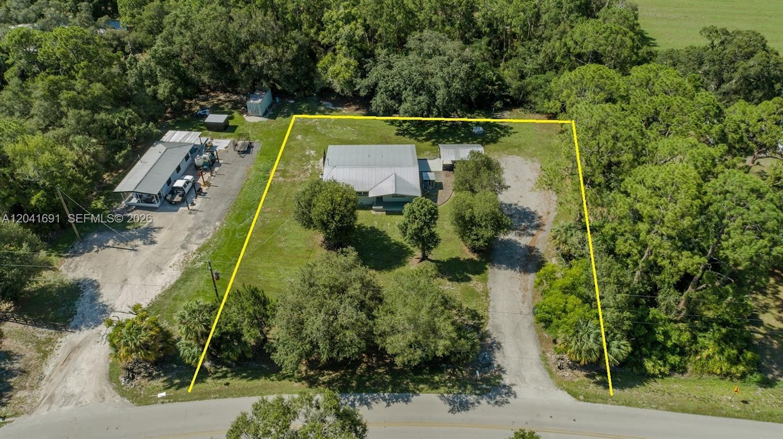 1270 Nobles Road LaBelle, FL 33935 - Photo 15 of 18 an aerial view of a house with a yard