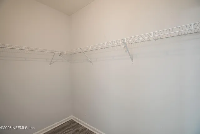a view of a room with racks on the wall