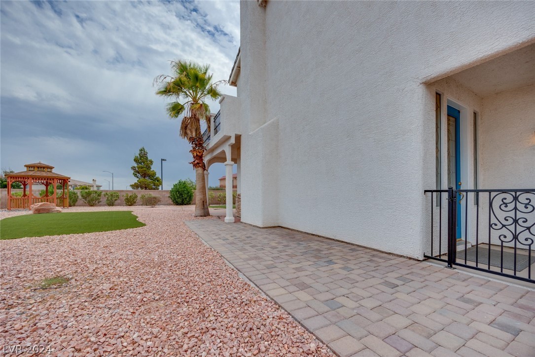 1700 Millstream Way Henderson, NV 89074 - Photo 72 of 78 Access to the front of the house