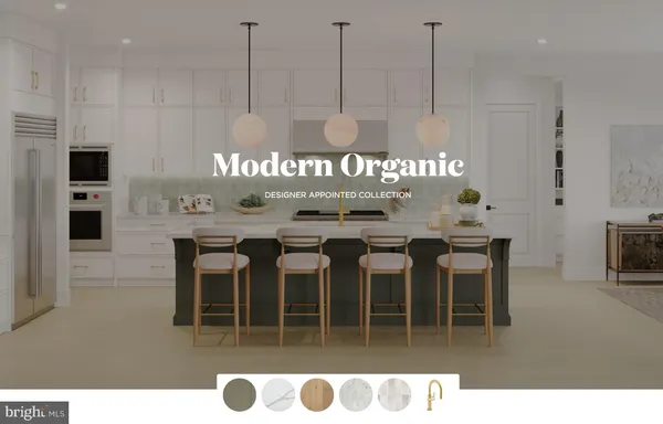 a kitchen with a dining table chairs and white cabinets