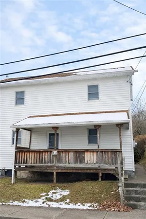 a view of a house with a balcony