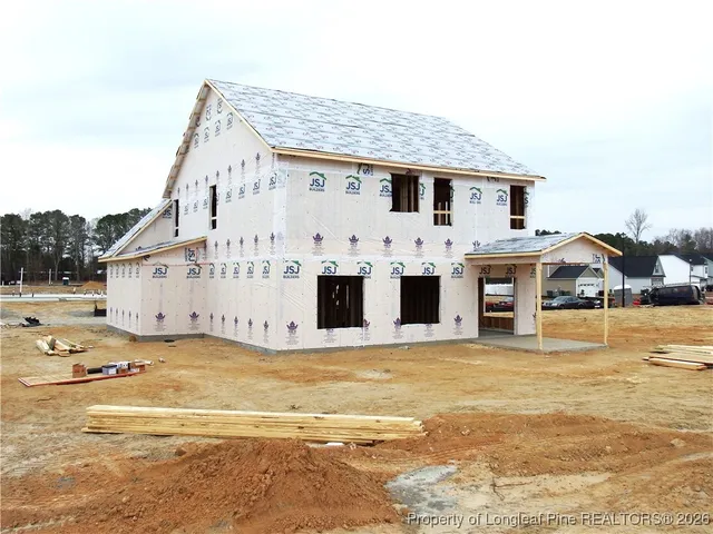 a view of house with ocean view