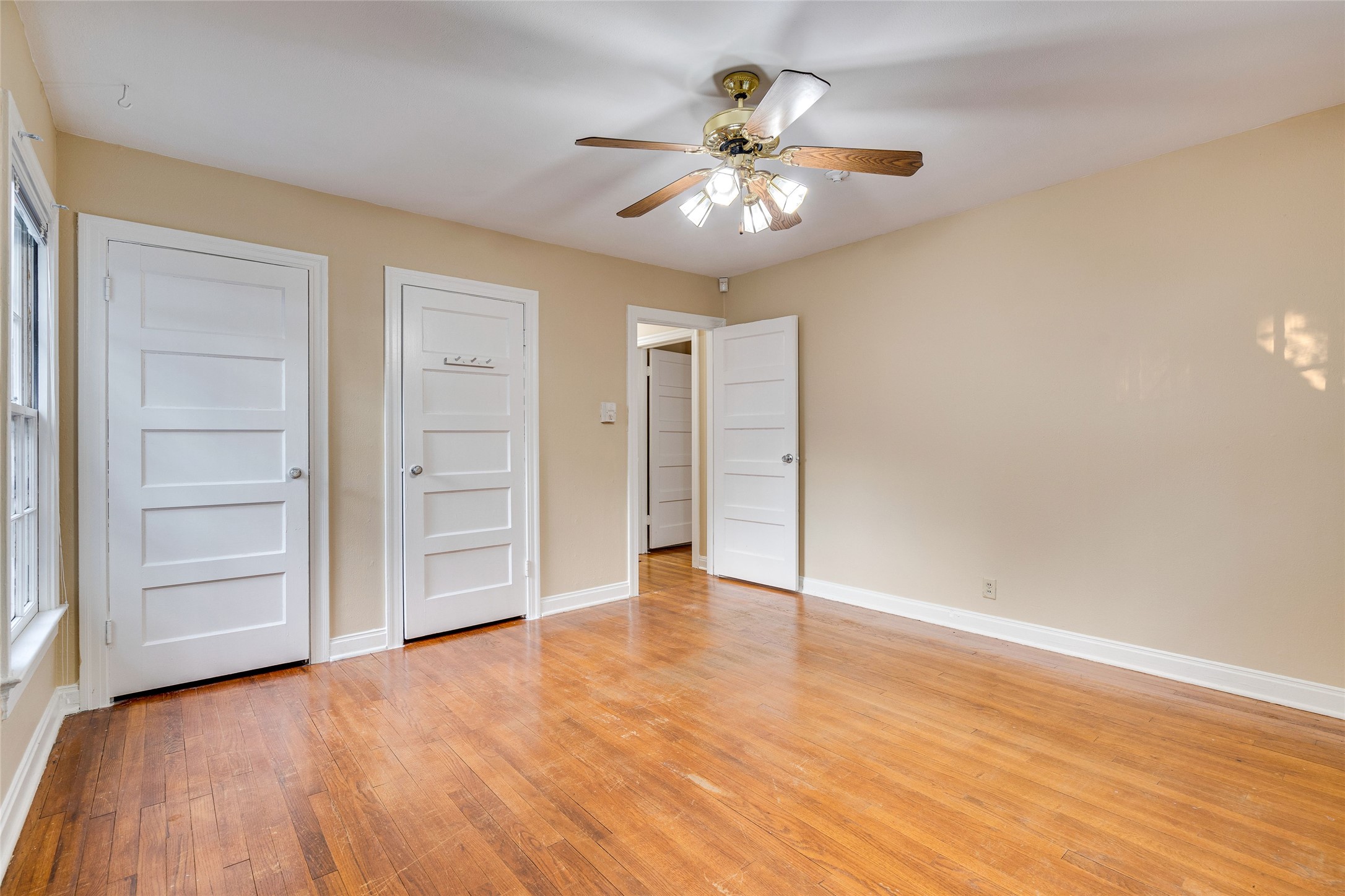 1011 East 49th Street Austin, TX 78751 - Photo 19 of 35 a view of an empty room with a chandelier