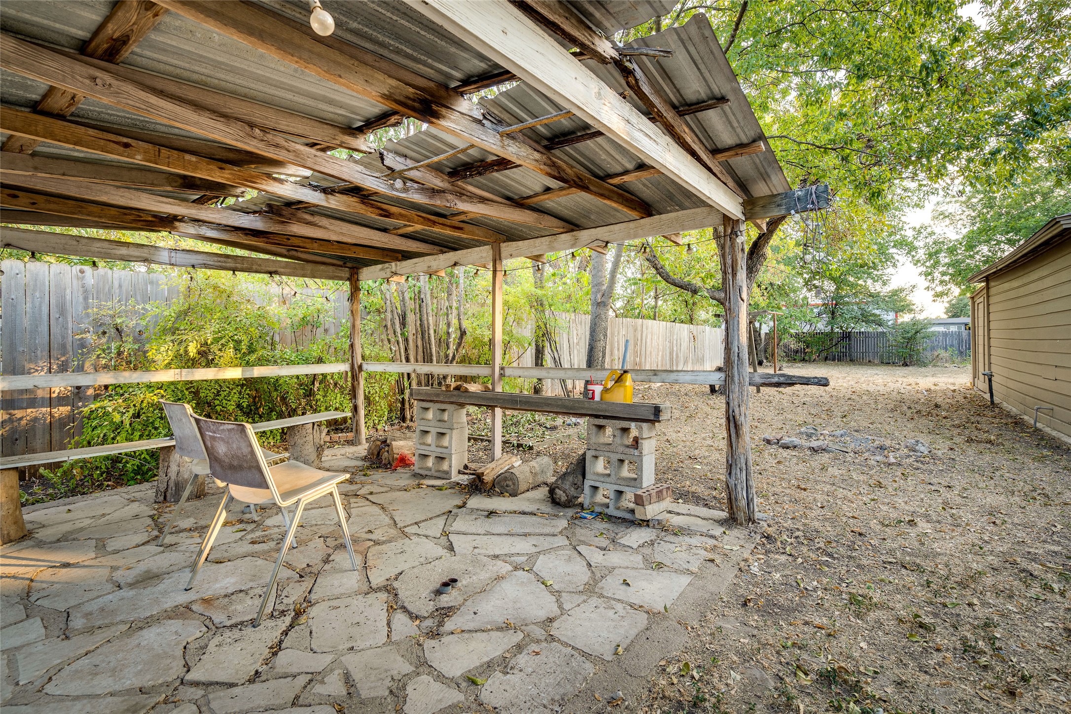 1011 East 49th Street Austin, TX 78751 - Photo 32 of 35 a view of chairs and tables in the patio