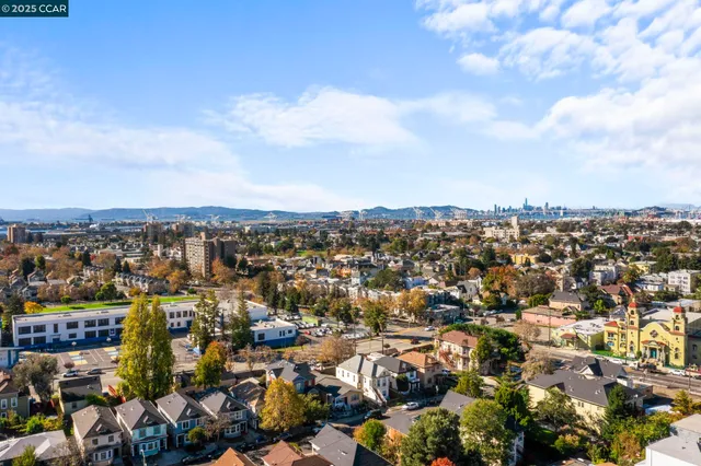 an aerial view of residential building and lake