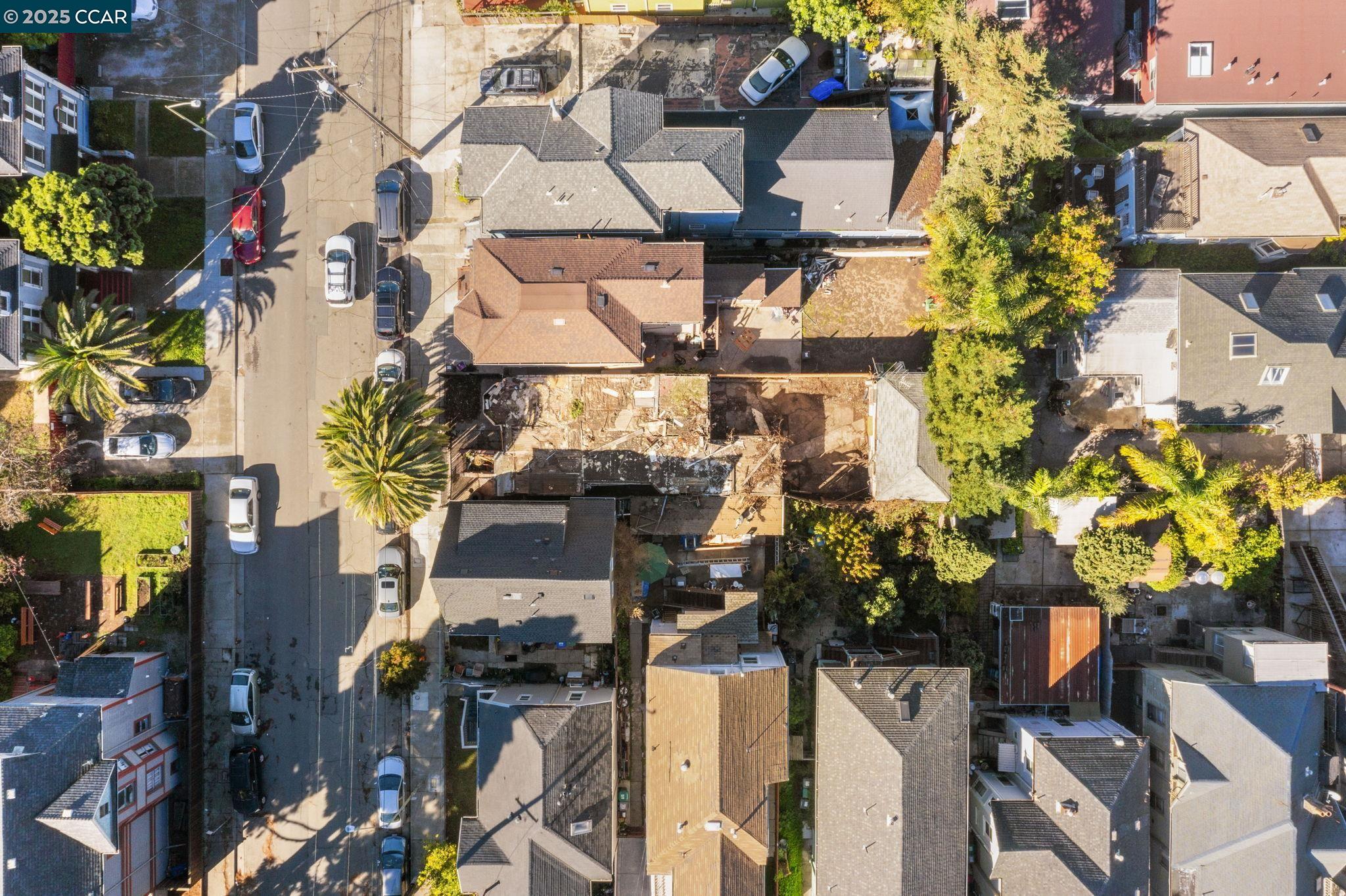 814 20th Street Oakland, CA 94607 - Photo 3 of 27 a picture of a building with a lot of flowers