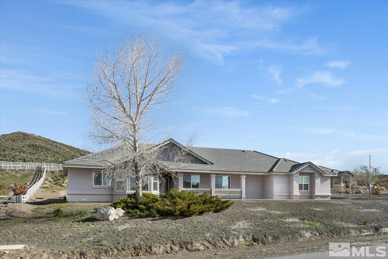 front view of a house with a dry yard