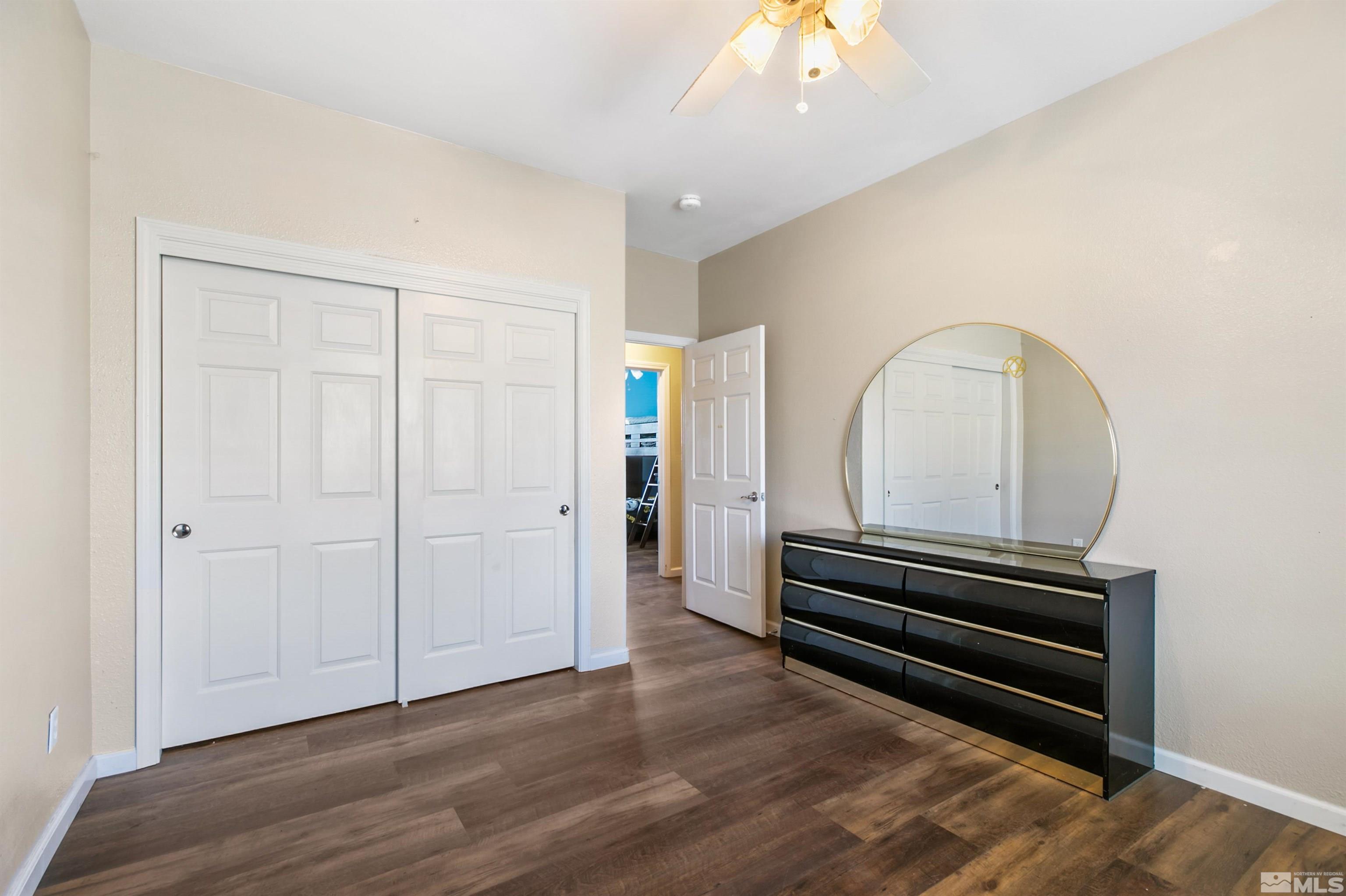 1095 Sage Street Fernley, NV 89408 - Photo 32 of 37 a view of entryway with wooden floor