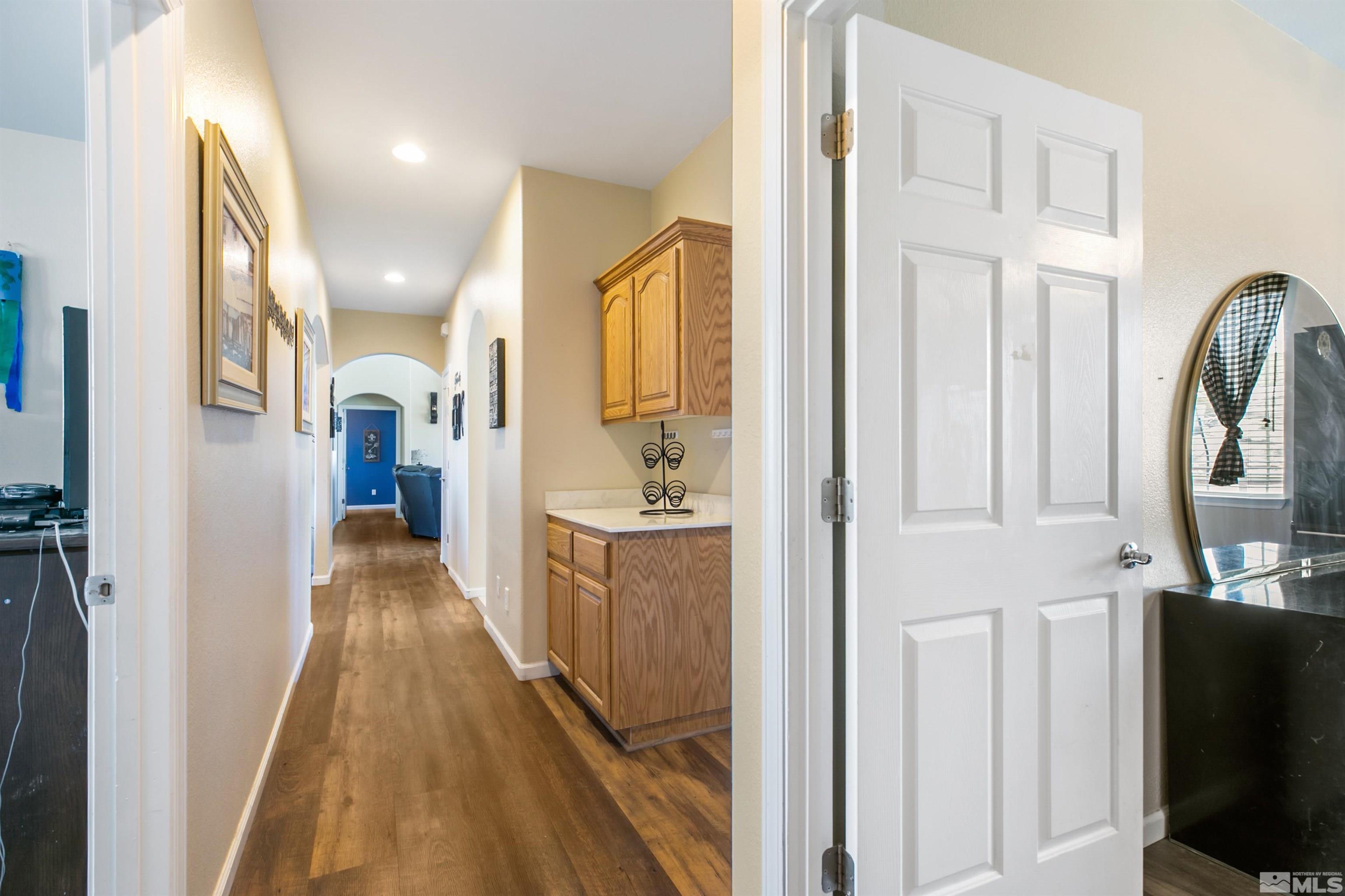 1095 Sage Street Fernley, NV 89408 - Photo 33 of 37 a view of a bathroom from the hallway