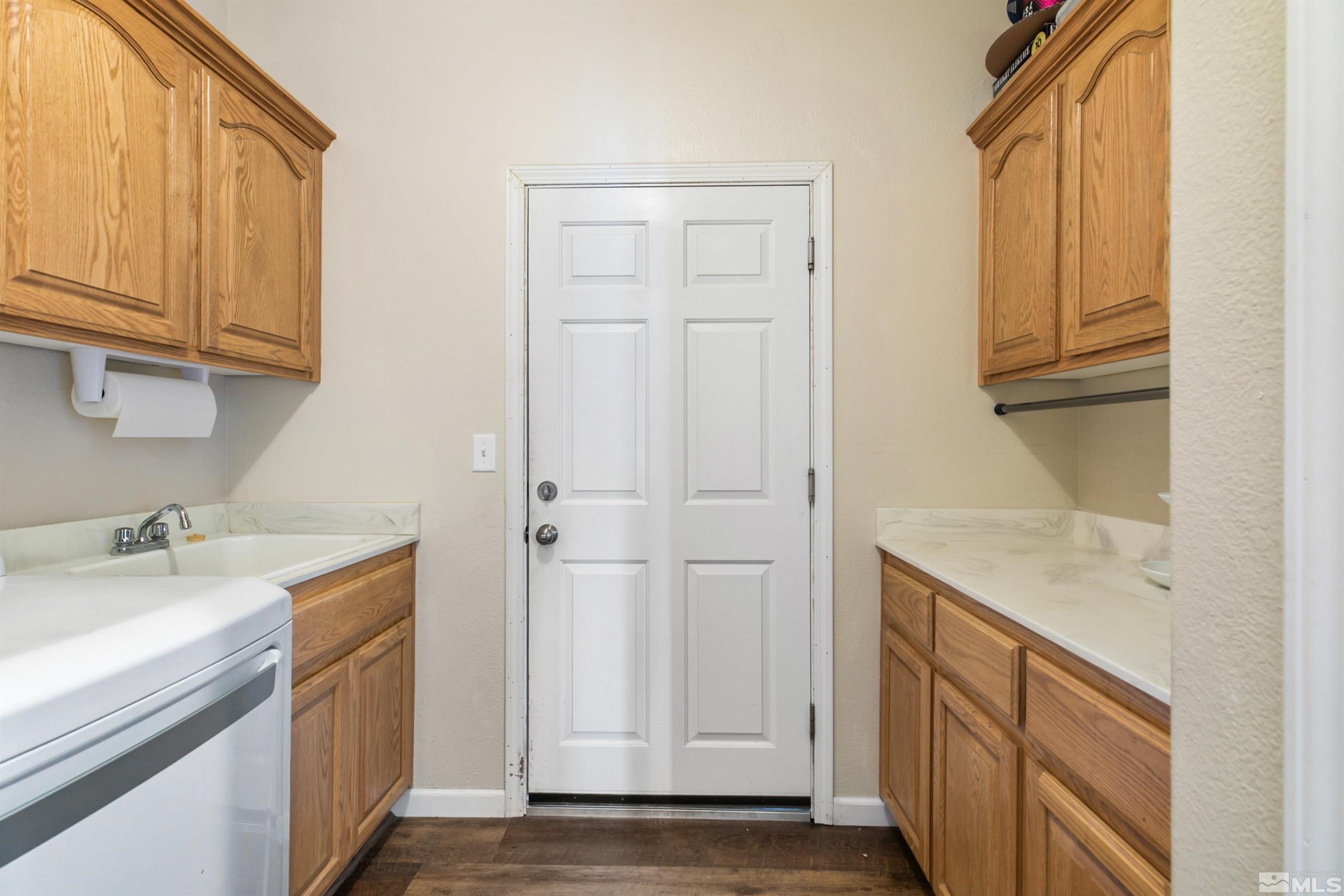 1095 Sage Street Fernley, NV 89408 - Photo 36 of 37 a bathroom with a sink and a mirror