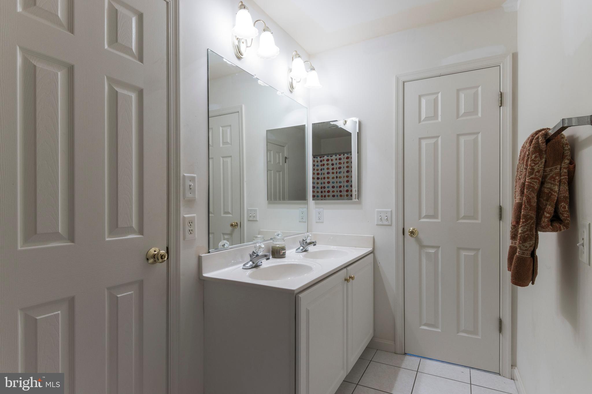 8640 Willow Run Road Windsor Mill, MD 21244 - Photo 24 of 37 Jack and Jill Hall Bath