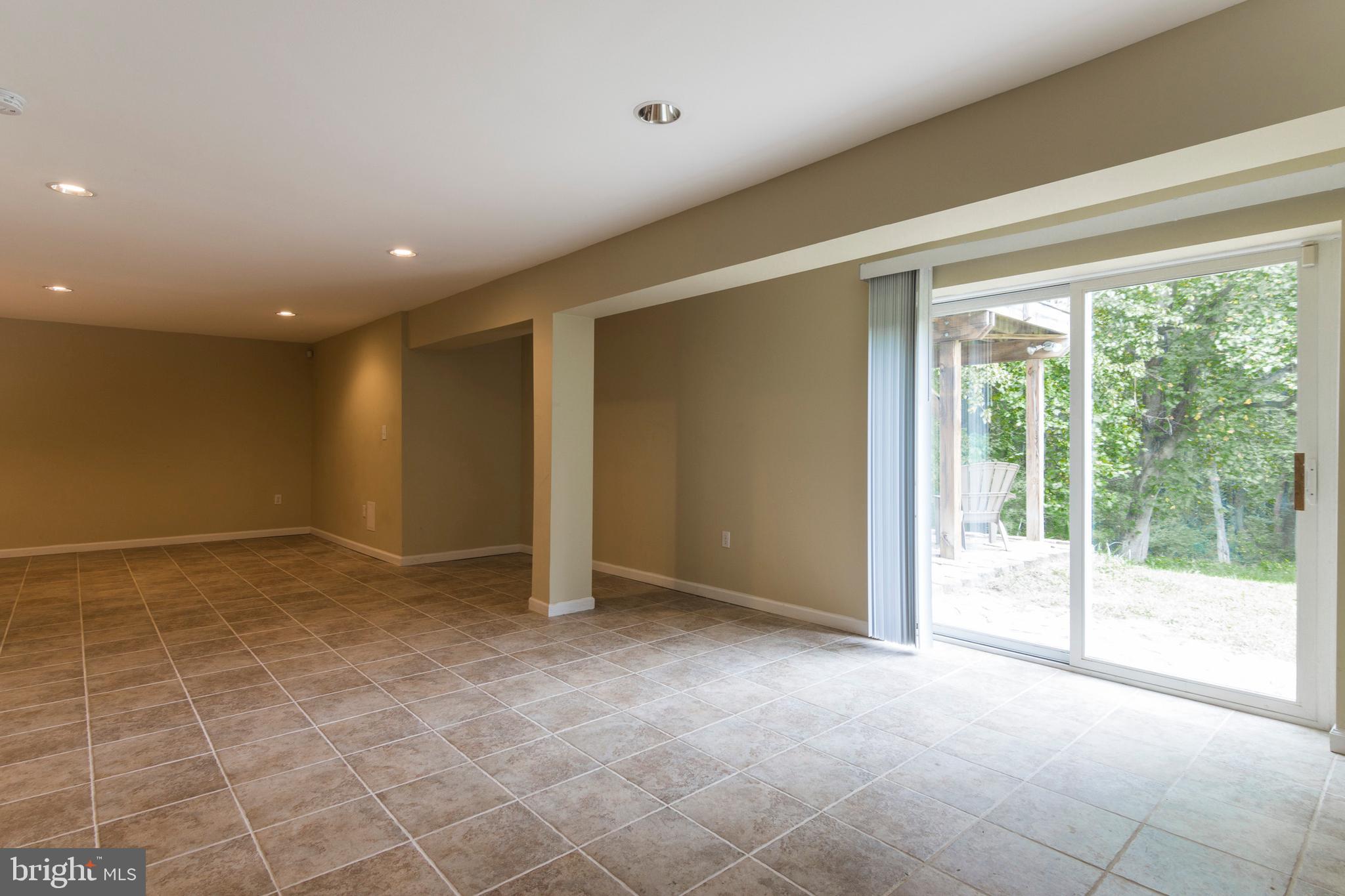 8640 Willow Run Road Windsor Mill, MD 21244 - Photo 30 of 37 Recreation Room w/Slider to Patio