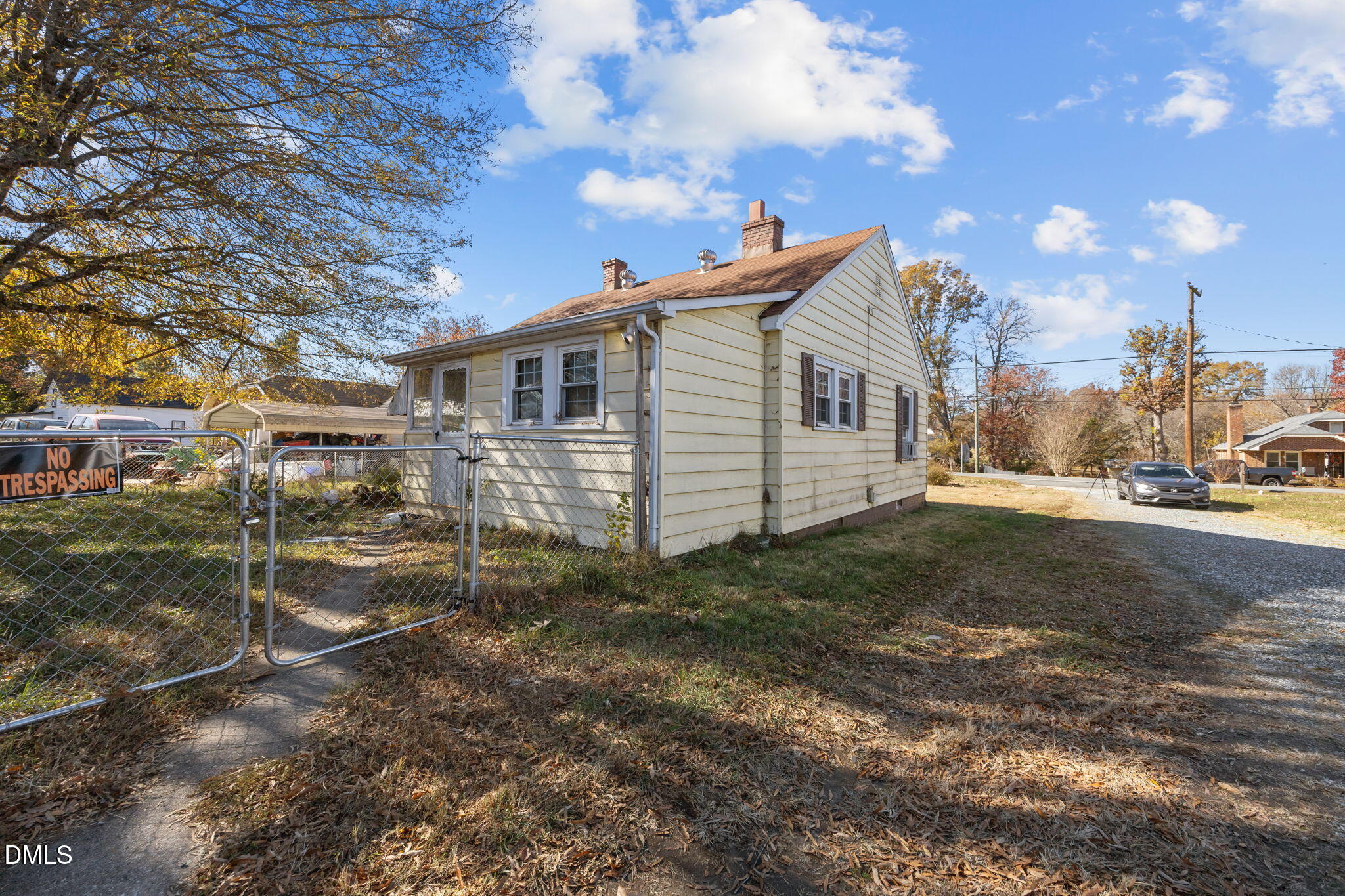 1713 Lower Hopedale Road Burlington, NC 27217 - Photo 12 of 13 a view of a house with a yard