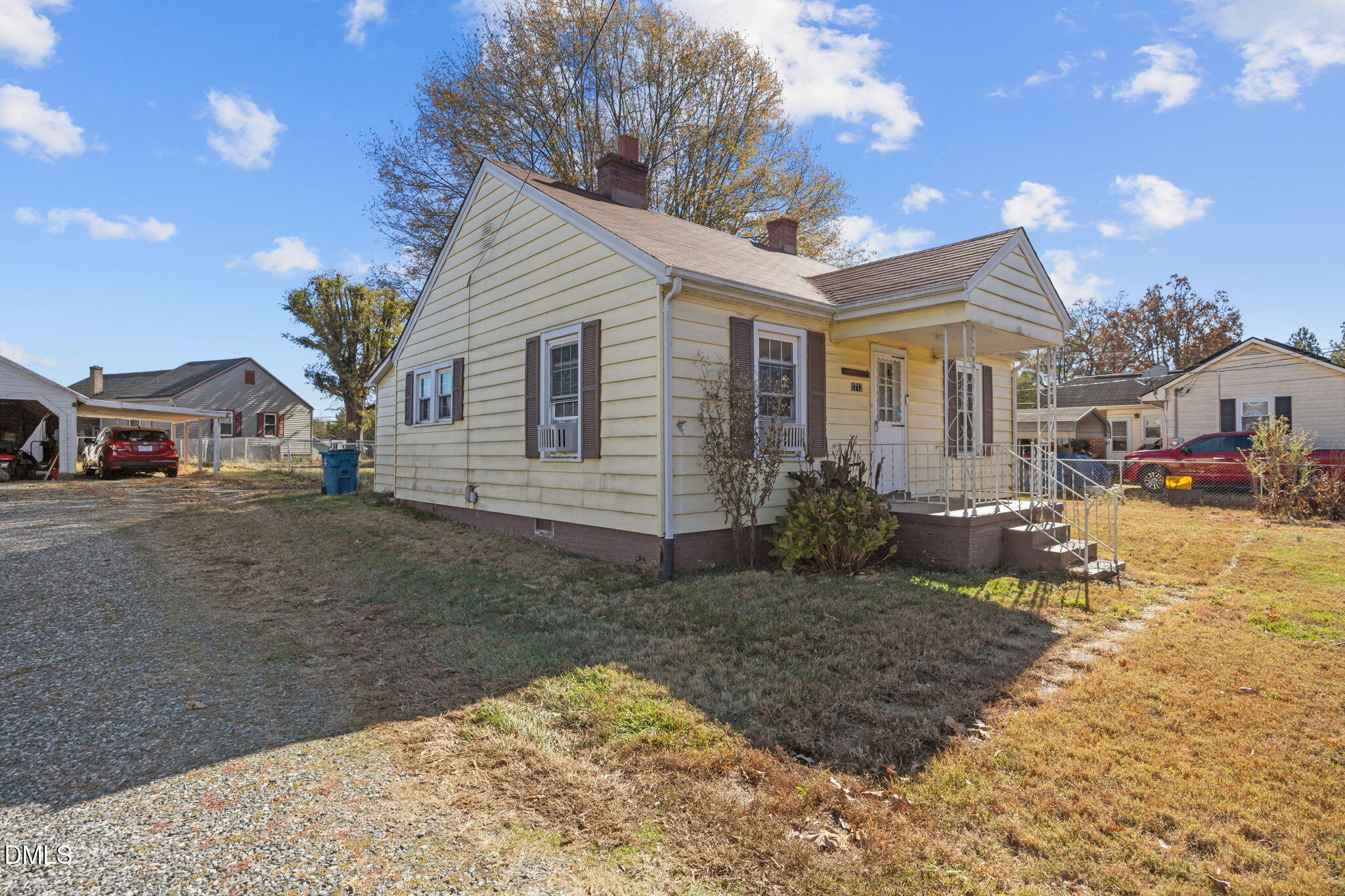 1713 Lower Hopedale Road Burlington, NC 27217 - Photo 2 of 13 a view of a white house in front of a yard