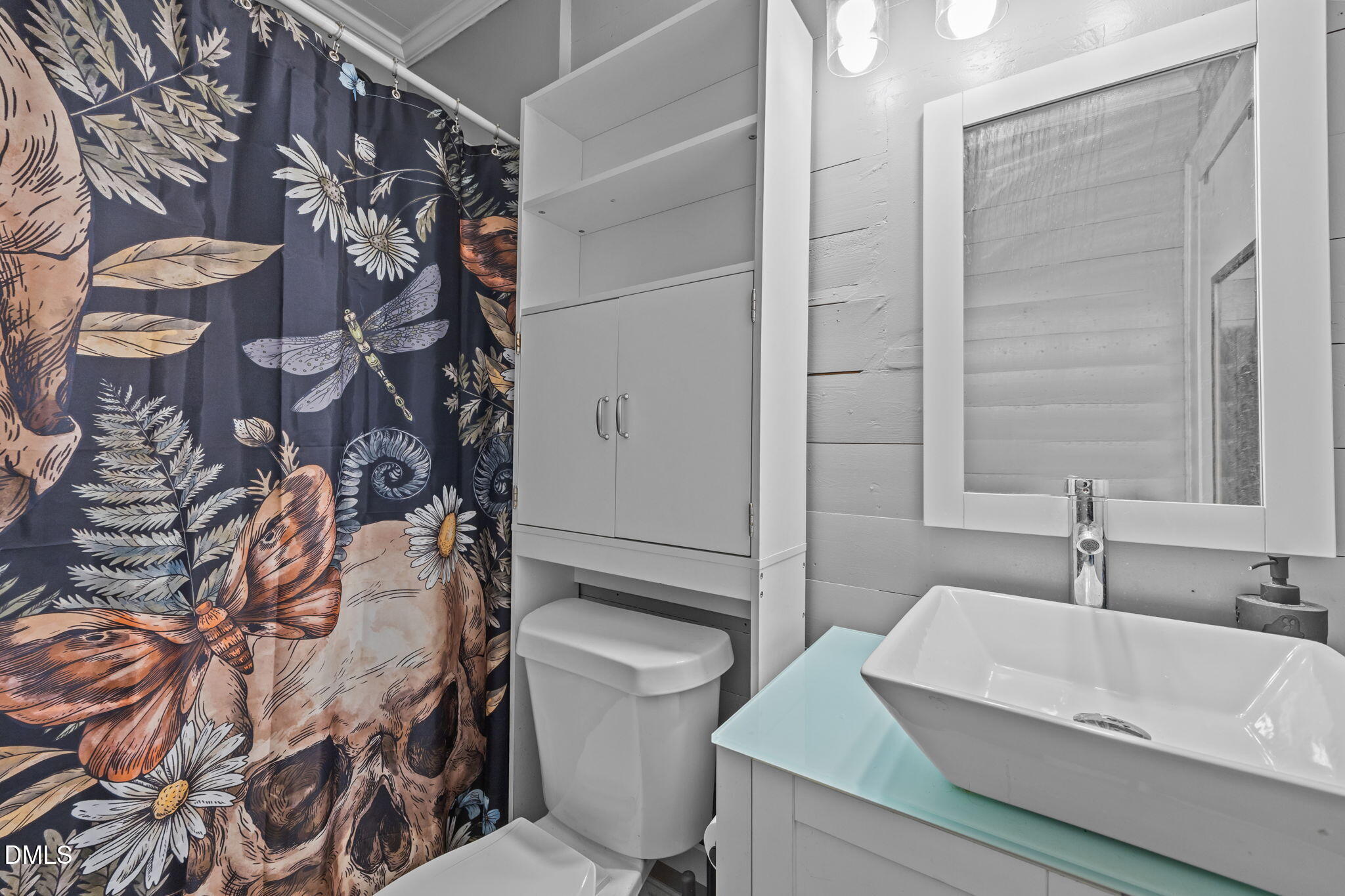 1713 Lower Hopedale Road Burlington, NC 27217 - Photo 8 of 13 a bathroom with a sink toilet and shower