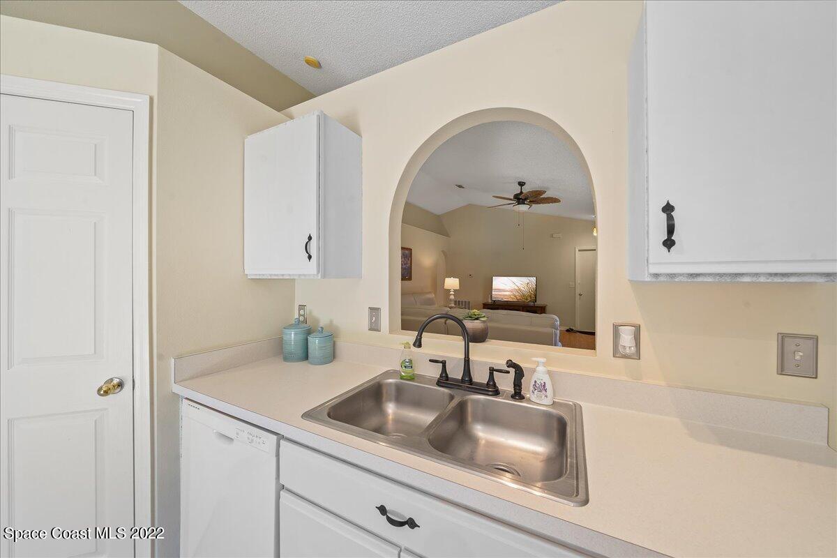 2177 Redwood Circle Palm Bay, FL 32905 - Photo 11 of 30 a close view of a sink and a mirror