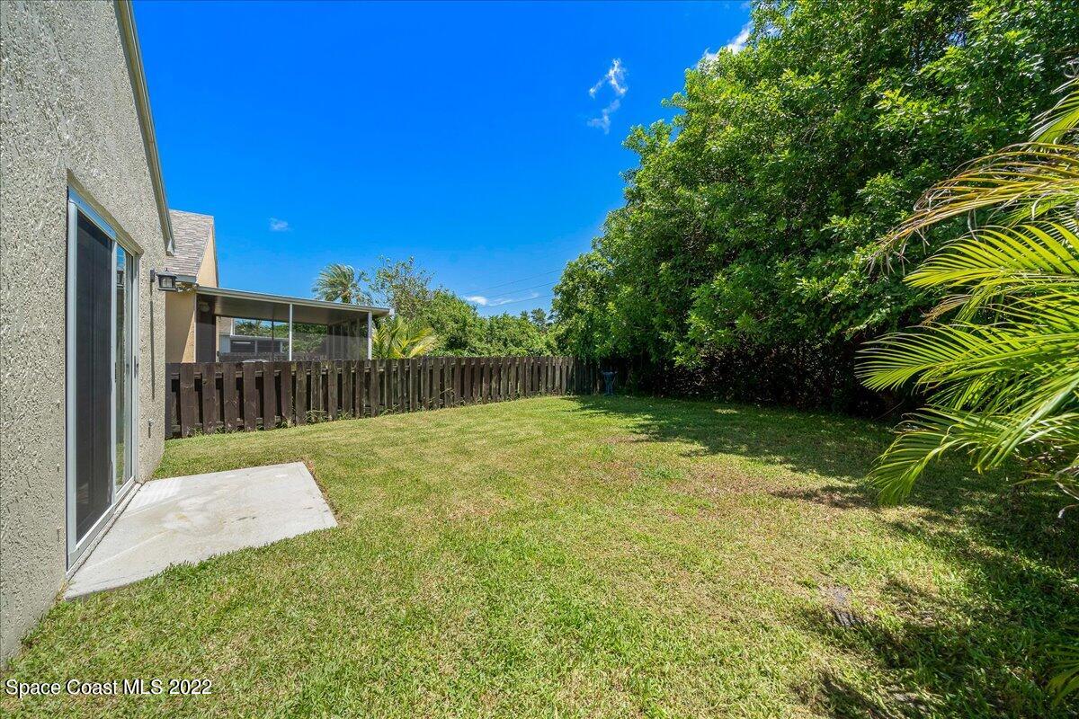 2177 Redwood Circle Palm Bay, FL 32905 - Photo 24 of 30 a view of a backyard