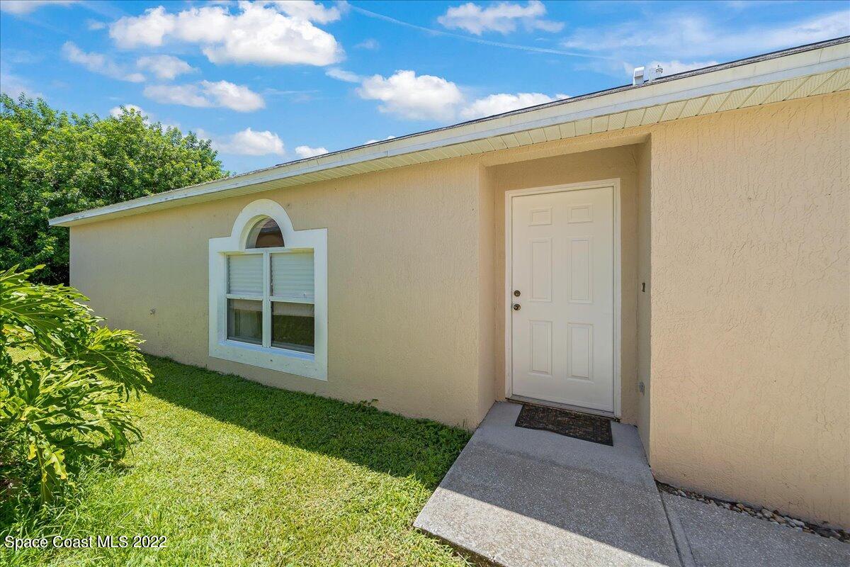 2177 Redwood Circle Palm Bay, FL 32905 - Photo 26 of 30 a view of outdoor space yard and porch