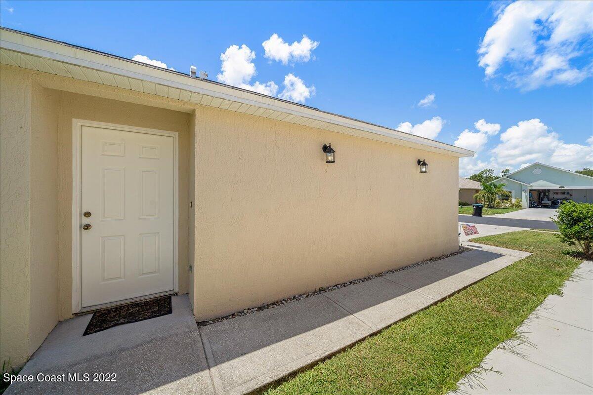 2177 Redwood Circle Palm Bay, FL 32905 - Photo 27 of 30 a view of a room with a entertaining space