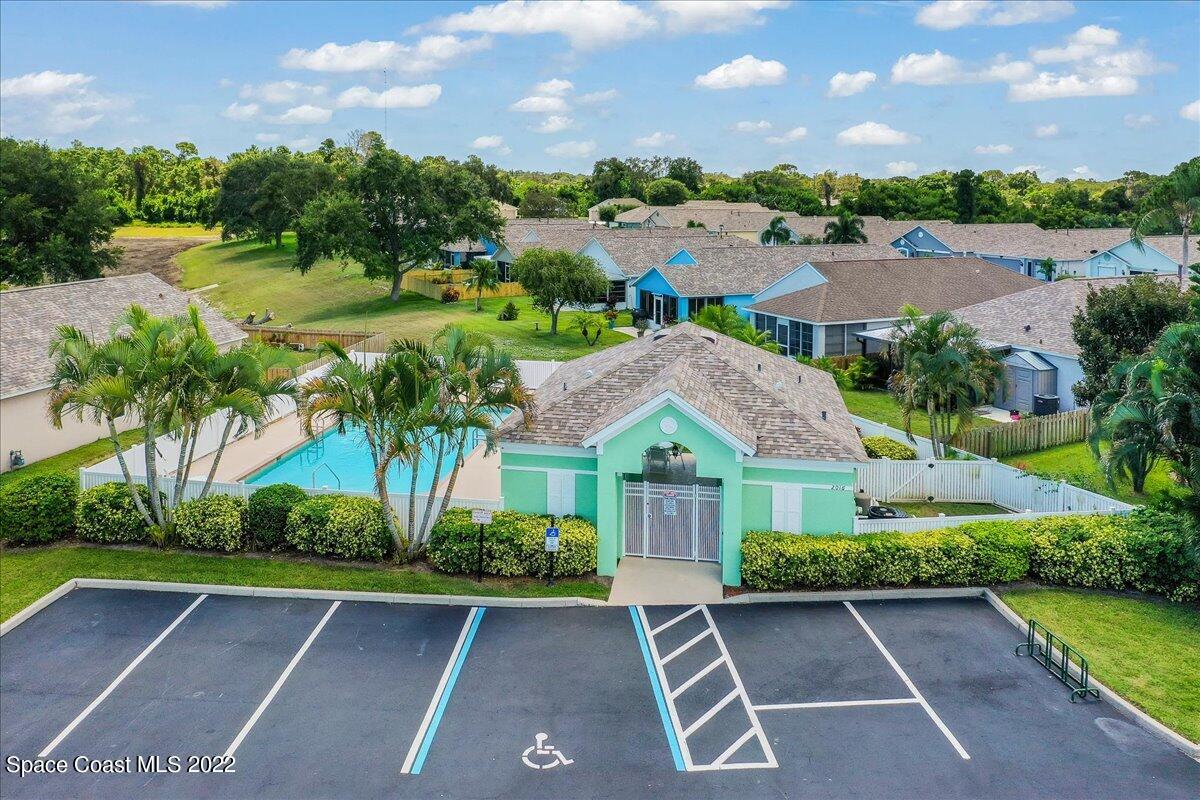 2177 Redwood Circle Palm Bay, FL 32905 - Photo 28 of 30 a view of a garden with a lake