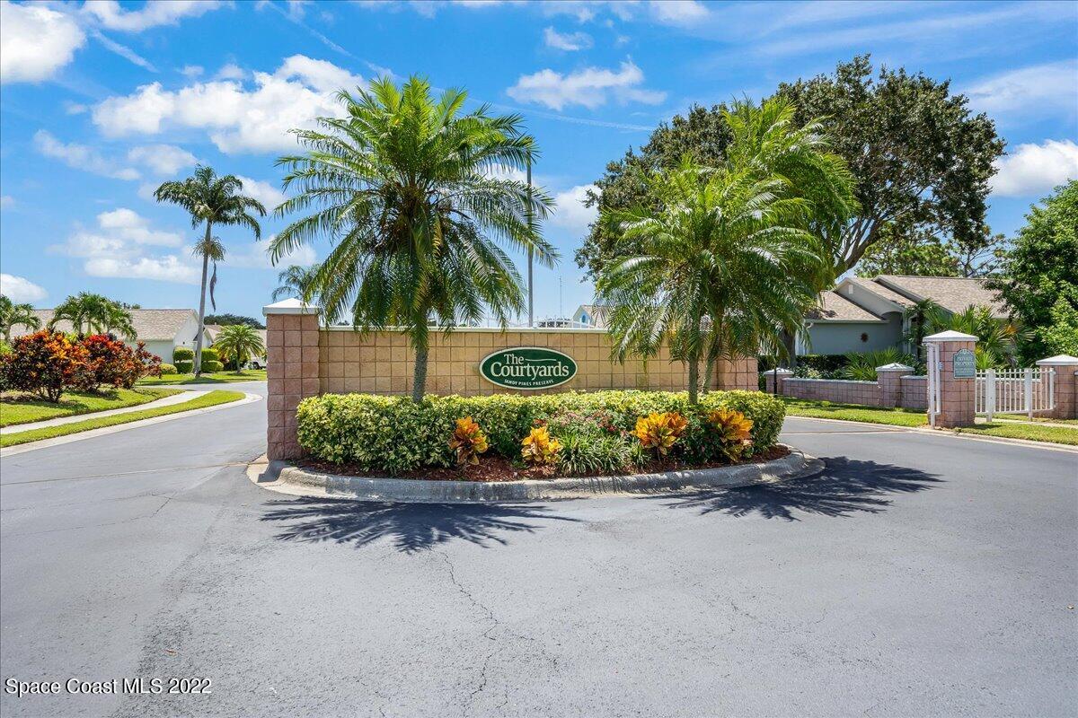 2177 Redwood Circle Palm Bay, FL 32905 - Photo 30 of 30 a view of a street with a building in front of it