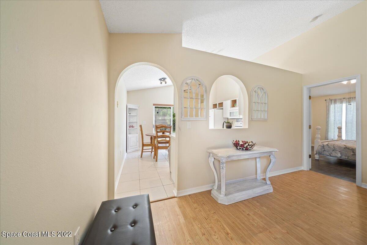 2177 Redwood Circle Palm Bay, FL 32905 - Photo 7 of 30 a living room with furniture and a window