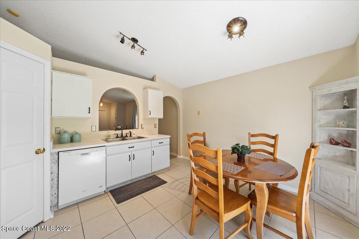 2177 Redwood Circle Palm Bay, FL 32905 - Photo 8 of 30 a dining room with furniture and window