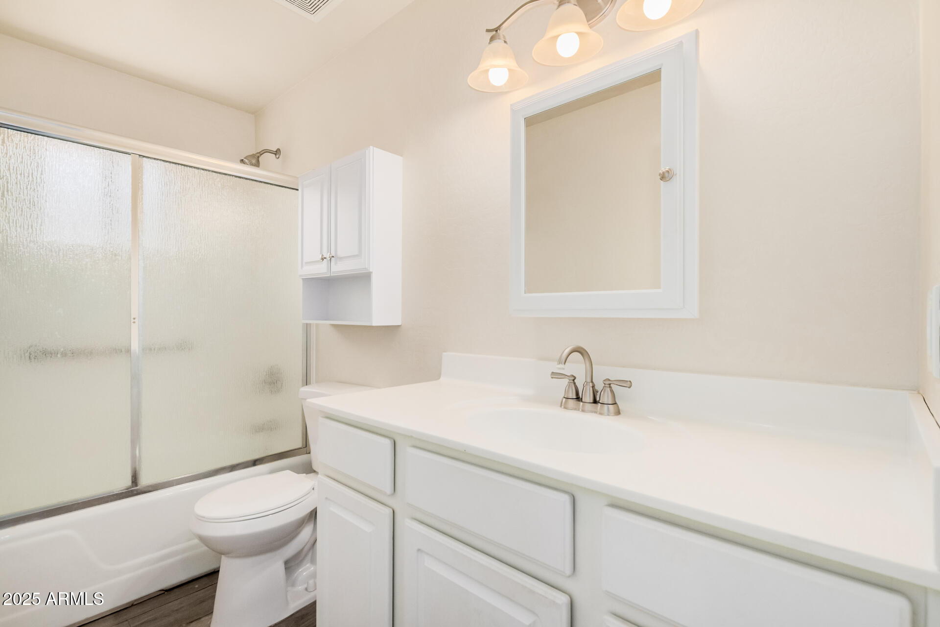 5533 East Decatur Street Mesa, AZ 85205 - Photo 17 of 29 a bathroom with a sink a toilet and shower