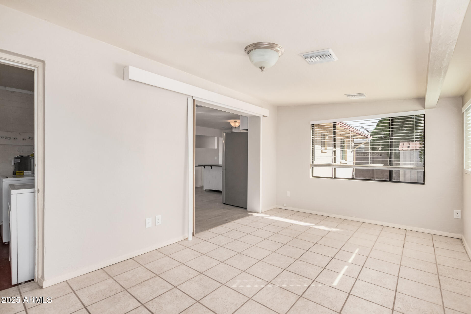 5533 East Decatur Street Mesa, AZ 85205 - Photo 19 of 29 a view of an empty room and window