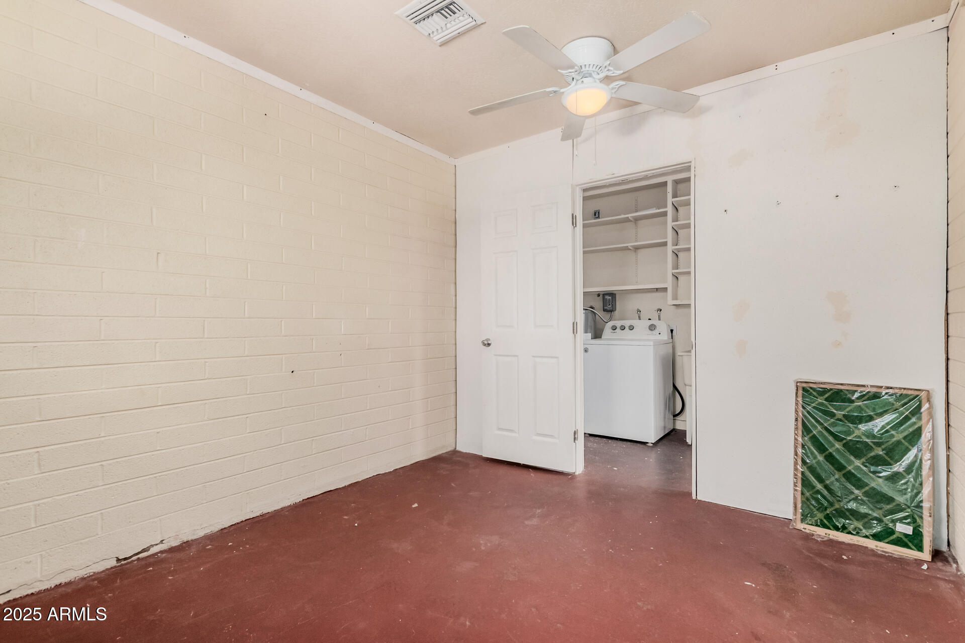 5533 East Decatur Street Mesa, AZ 85205 - Photo 21 of 29 an empty room with windows and closet