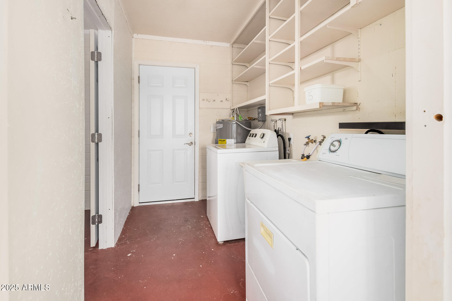 5533 East Decatur Street Mesa, AZ 85205 - Photo 22 of 29 a utility room with dryer and washer
