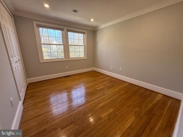 3409 Beret Lane Silver Spring, MD 20906 - Photo 12 of 18 an empty room with wooden floor and windows