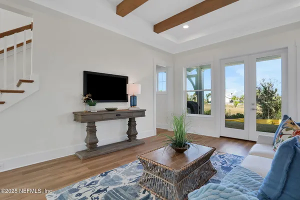 a kitchen with a sink cabinets and a stove