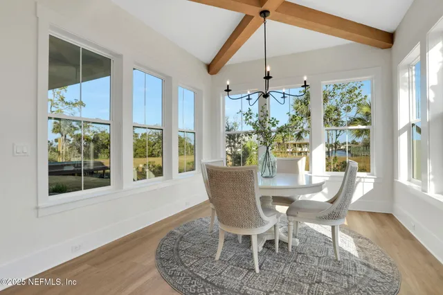a bathroom with double sink and a mirror