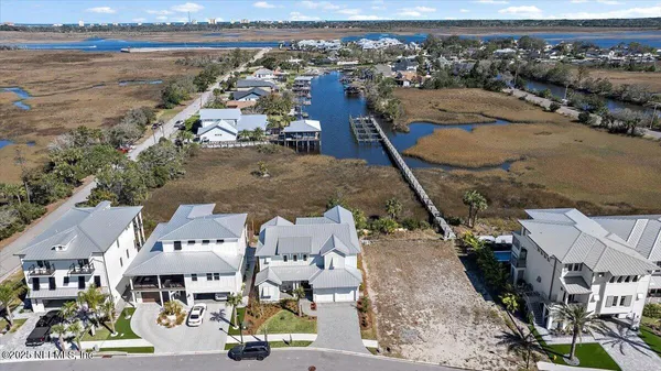 an aerial view of a house with a garden