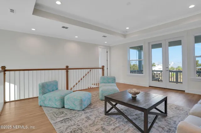a bathroom with a bathtub sink and mirror