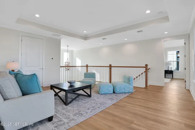 a view of a livingroom with furniture and window